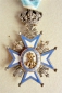 Der St.-Sava-Orden Ritterkreuz, 1 Modell, 1 Typ, der Heilige im roten Mantel