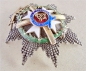 The Order of the Cross of Takovo breast star Grand Officer with swords